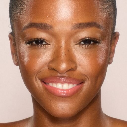 UNREAL SKIN SHEER GLOW TINT FUGTTILFØRENDE FOUNDATION-STICK 12,5 TAN
