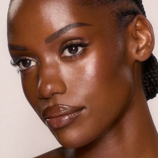 UNREAL SKIN SHEER GLOW TINT FUGTTILFØRENDE FOUNDATION-STICK 14 DEEP