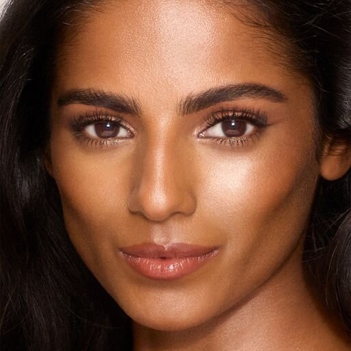 UNREAL SKIN SHEER GLOW TINT FUGTTILFØRENDE FOUNDATION-STICK 9 TAN